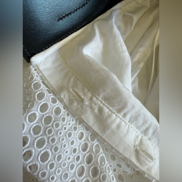 ALAÏA
Laser-cut leather-trimmed broderie anglaise cotton mini skirt - Picture 9 of 11